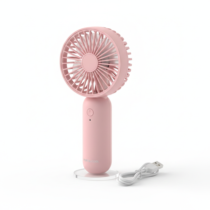 Pink mini handheld fan on white background